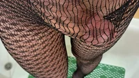 Big cock man cumming hard through black netlike tights in the bath - Image # 6