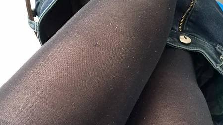 Man flashes black tights under jeans