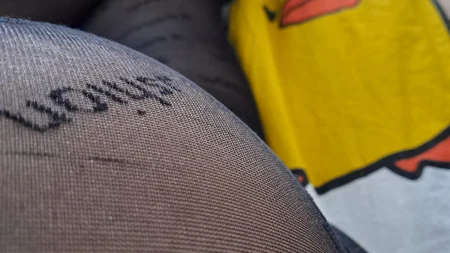 Guy shows off his long legs covered by black fashion tights - Image # 5