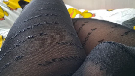 Guy shows off his long legs covered by black fashion tights - Image # 9