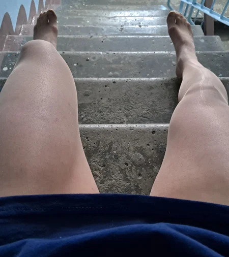 Crossdresser shows off his perfect nyloned legs - Image # 2