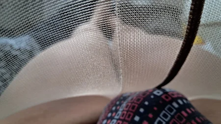 Man wearing suntan pantyhose teases on the bed - Image # 9