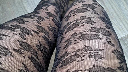 Man teases with his legs in sexy black tights - Image # 1