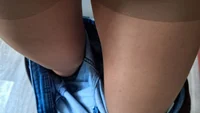 The guy takes off his jeans and shows off the control-top pantyhose underneath - Image # 2