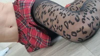 Slender crossdresser wearing black leopard pantyhose poses sexy and masturbates cock till orgasm - Image # 13
